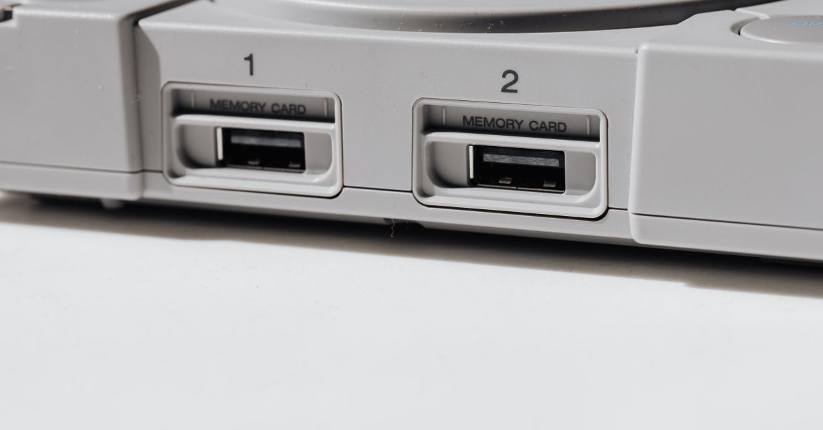 gaming console disc slot empty next to streaming waveform