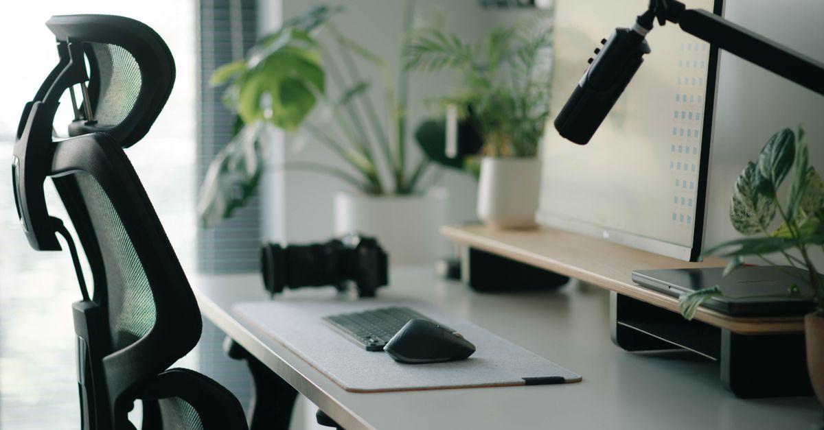 modern home office with ergonomic chair, natural mattress, stainless steel water filter