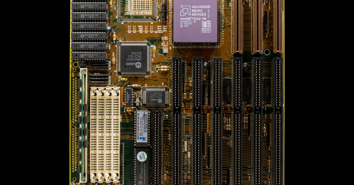 vintage Amiga computer with modern circuit board overlay