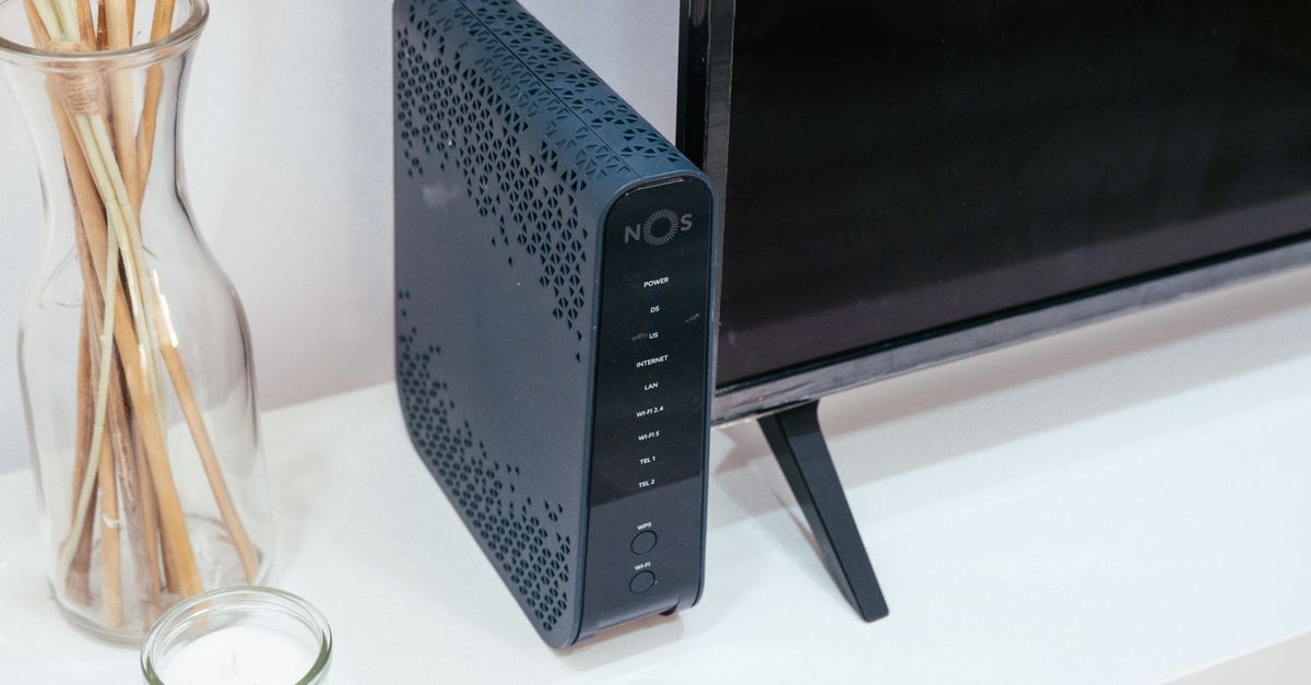 a sleek laptop and router with subtle Australian flag overlay