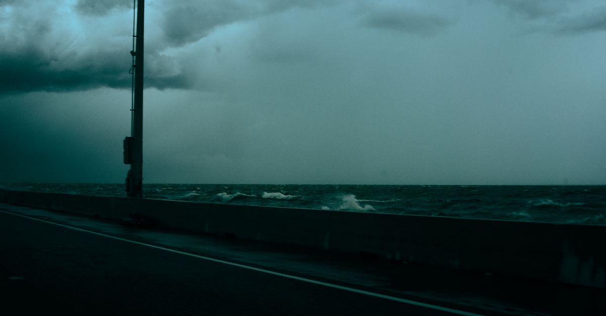 laboratory safety gear, storm clouds over ocean, Supreme Court building