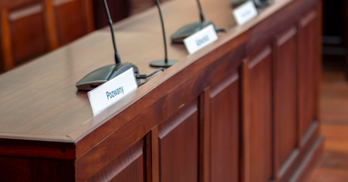 federal trade commission hearing room with microphones and data flow graphics