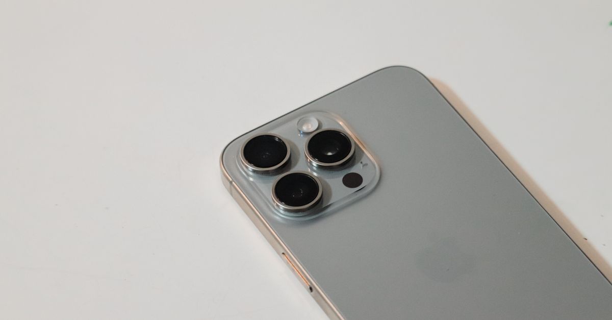 close-up of iPhone Duo camera module with Apple Pencil beside it